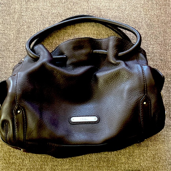 Cole Haan with silver details. Rarely used totally clean inside - Picture 1 of 3